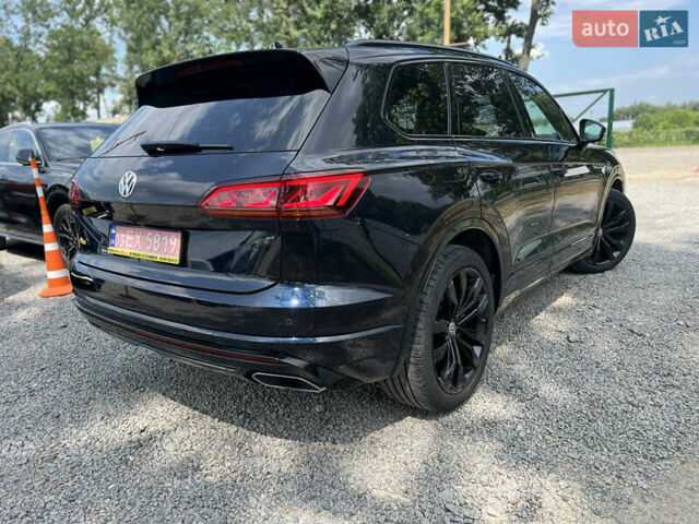 Синій Фольксваген Туарег, об'ємом двигуна 4 л та пробігом 144 тис. км за 52900 $, фото 2 на Automoto.ua