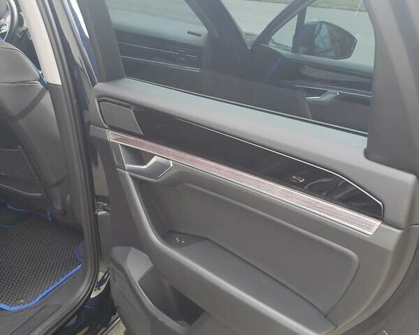 Синій Фольксваген Туарег, об'ємом двигуна 3 л та пробігом 107 тис. км за 37500 $, фото 4 на Automoto.ua