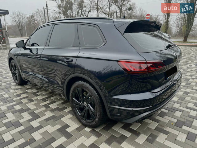 Синий Фольксваген Туарег, объемом двигателя 3 л и пробегом 115 тыс. км за 55000 $, фото 4 на Automoto.ua