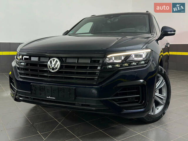 Синій Фольксваген Туарег, об'ємом двигуна 3 л та пробігом 117 тис. км за 52999 $, фото 1 на Automoto.ua