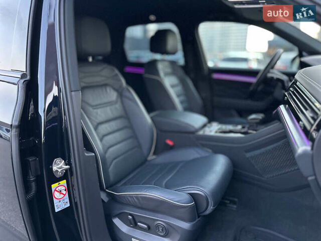 Синий Фольксваген Туарег, объемом двигателя 3 л и пробегом 74 тыс. км за 68700 $, фото 60 на Automoto.ua