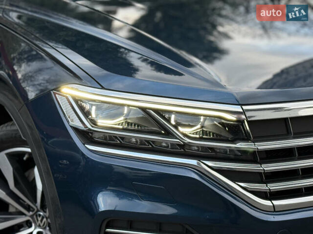 Синій Фольксваген Туарег, об'ємом двигуна 2.97 л та пробігом 145 тис. км за 54800 $, фото 1 на Automoto.ua