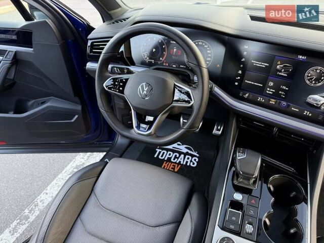 Синий Фольксваген Туарег, объемом двигателя 3 л и пробегом 79 тыс. км за 62500 $, фото 59 на Automoto.ua