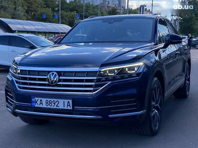 Синий Фольксваген Туарег, объемом двигателя 3 л и пробегом 55 тыс. км за 64900 $, фото 1 на Automoto.ua