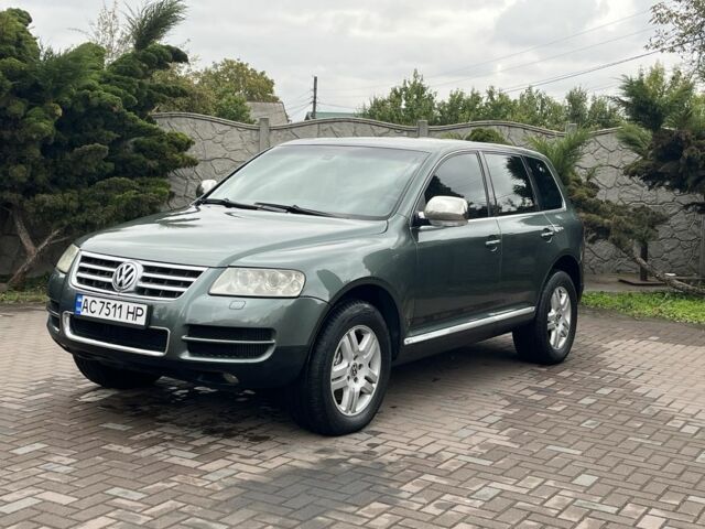 Зеленый Фольксваген Туарег, объемом двигателя 4.9 л и пробегом 280 тыс. км за 5999 $, фото 1 на Automoto.ua