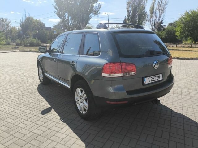 Зеленый Фольксваген Туарег, объемом двигателя 3.2 л и пробегом 282 тыс. км за 7800 $, фото 3 на Automoto.ua