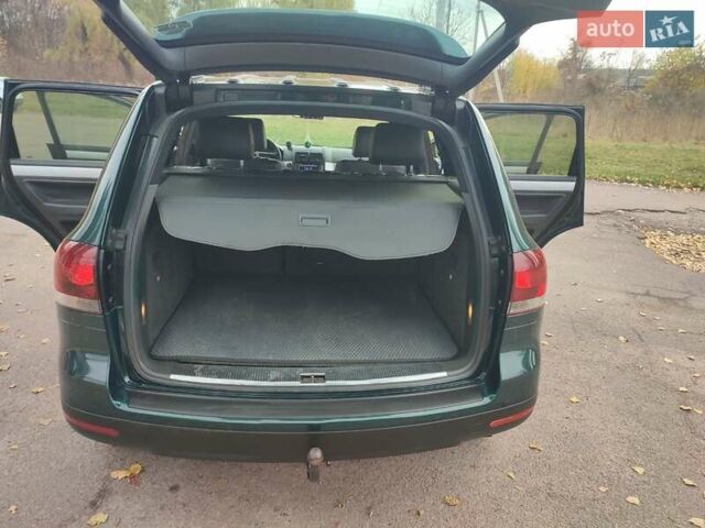 Зелений Фольксваген Туарег, об'ємом двигуна 2.46 л та пробігом 322 тис. км за 7200 $, фото 12 на Automoto.ua