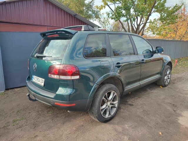 Зеленый Фольксваген Туарег, объемом двигателя 2.5 л и пробегом 322 тыс. км за 7200 $, фото 13 на Automoto.ua