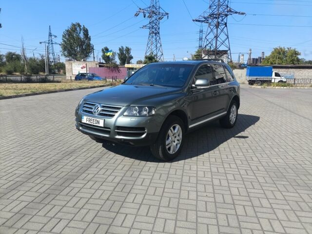 Зеленый Фольксваген Туарег, объемом двигателя 3.2 л и пробегом 282 тыс. км за 7800 $, фото 1 на Automoto.ua