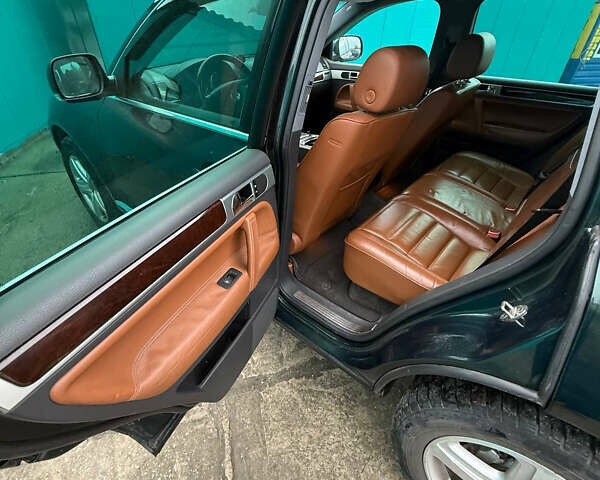 Зеленый Фольксваген Туарег, объемом двигателя 4.92 л и пробегом 201 тыс. км за 6800 $, фото 12 на Automoto.ua