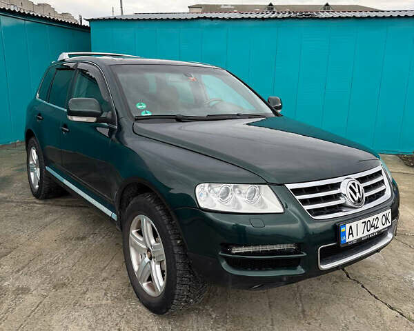 Зеленый Фольксваген Туарег, объемом двигателя 4.92 л и пробегом 201 тыс. км за 6800 $, фото 1 на Automoto.ua