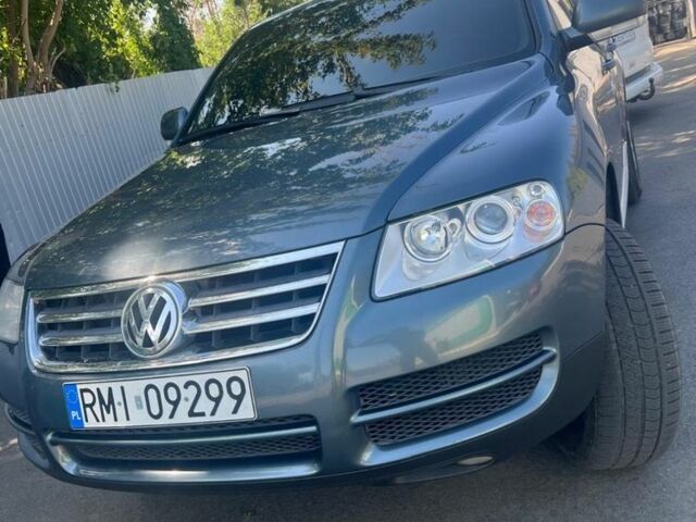 Зеленый Фольксваген Туарег, объемом двигателя 2.5 л и пробегом 281 тыс. км за 5000 $, фото 1 на Automoto.ua