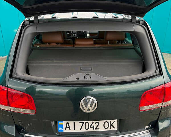 Зеленый Фольксваген Туарег, объемом двигателя 4.92 л и пробегом 201 тыс. км за 6800 $, фото 19 на Automoto.ua