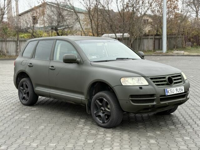 Зеленый Фольксваген Туарег, объемом двигателя 2.5 л и пробегом 370 тыс. км за 3699 $, фото 1 на Automoto.ua