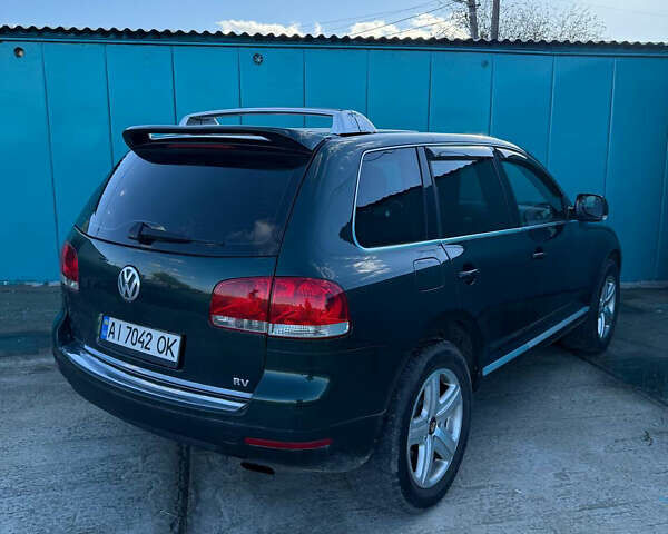 Зеленый Фольксваген Туарег, объемом двигателя 4.92 л и пробегом 201 тыс. км за 6800 $, фото 5 на Automoto.ua