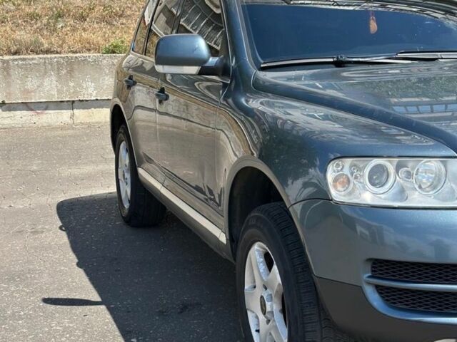 Зеленый Фольксваген Туарег, объемом двигателя 2.5 л и пробегом 281 тыс. км за 5000 $, фото 5 на Automoto.ua