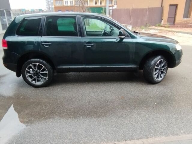 Зеленый Фольксваген Туарег, объемом двигателя 2.5 л и пробегом 452 тыс. км за 4700 $, фото 1 на Automoto.ua