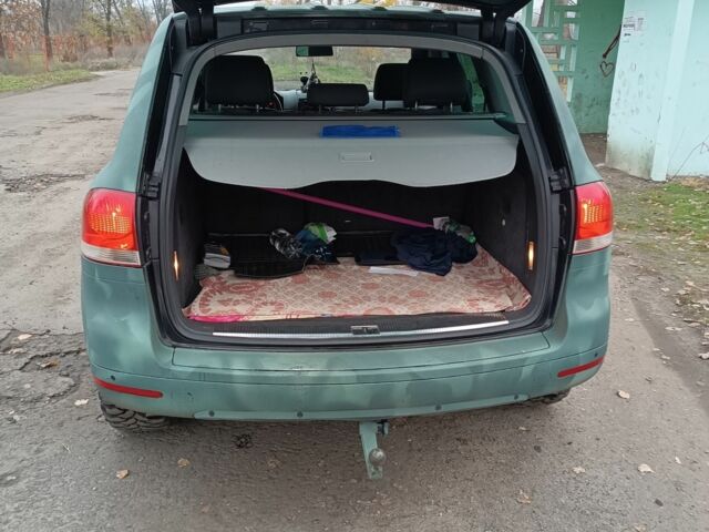 Зеленый Фольксваген Туарег, объемом двигателя 2.5 л и пробегом 300 тыс. км за 5000 $, фото 3 на Automoto.ua