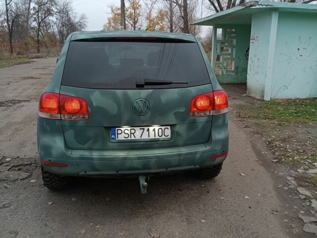 Зеленый Фольксваген Туарег, объемом двигателя 2.5 л и пробегом 300 тыс. км за 5000 $, фото 2 на Automoto.ua