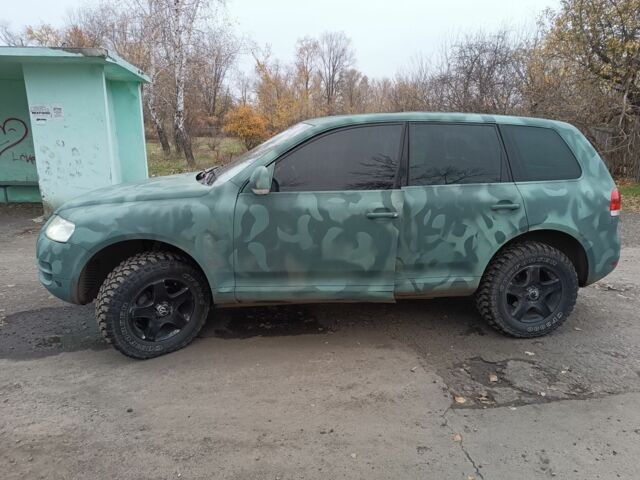 Зеленый Фольксваген Туарег, объемом двигателя 2.5 л и пробегом 300 тыс. км за 5000 $, фото 1 на Automoto.ua