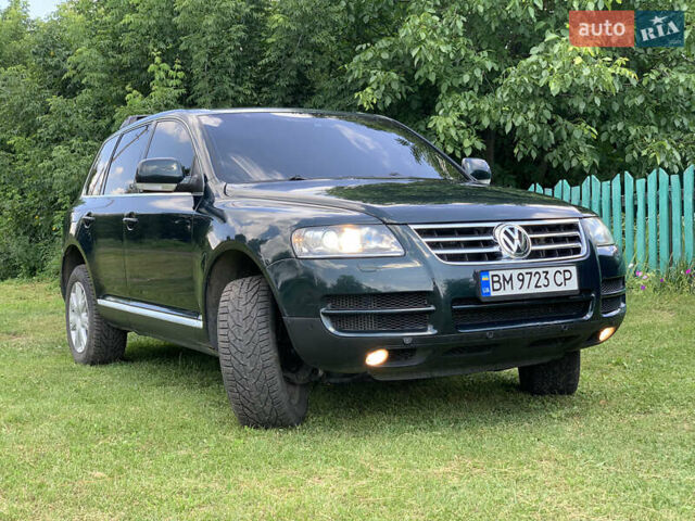 Зелений Фольксваген Туарег, об'ємом двигуна 3 л та пробігом 380 тис. км за 7200 $, фото 1 на Automoto.ua