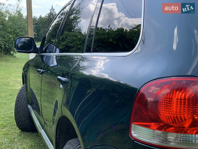 Зелений Фольксваген Туарег, об'ємом двигуна 3 л та пробігом 380 тис. км за 7200 $, фото 28 на Automoto.ua