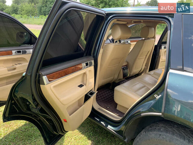 Зелений Фольксваген Туарег, об'ємом двигуна 3 л та пробігом 380 тис. км за 7200 $, фото 13 на Automoto.ua