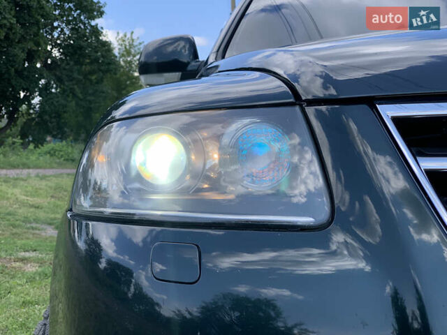 Зелений Фольксваген Туарег, об'ємом двигуна 3 л та пробігом 380 тис. км за 7200 $, фото 30 на Automoto.ua