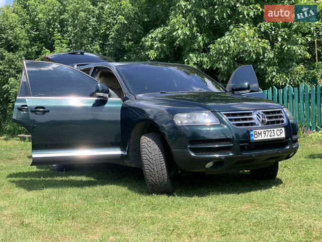 Зелений Фольксваген Туарег, об'ємом двигуна 3 л та пробігом 380 тис. км за 7200 $, фото 7 на Automoto.ua