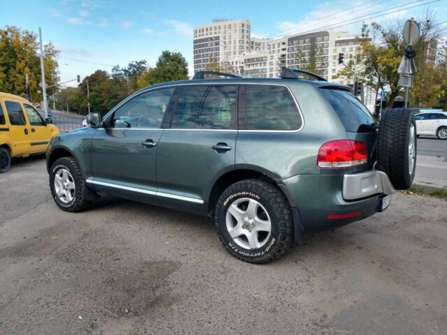 Зеленый Фольксваген Туарег, объемом двигателя 2.5 л и пробегом 316 тыс. км за 10900 $, фото 6 на Automoto.ua