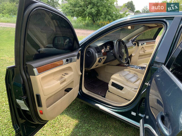 Зелений Фольксваген Туарег, об'ємом двигуна 3 л та пробігом 380 тис. км за 7200 $, фото 14 на Automoto.ua