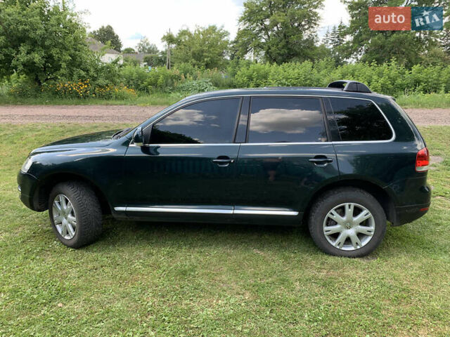 Зелений Фольксваген Туарег, об'ємом двигуна 3 л та пробігом 380 тис. км за 7200 $, фото 6 на Automoto.ua