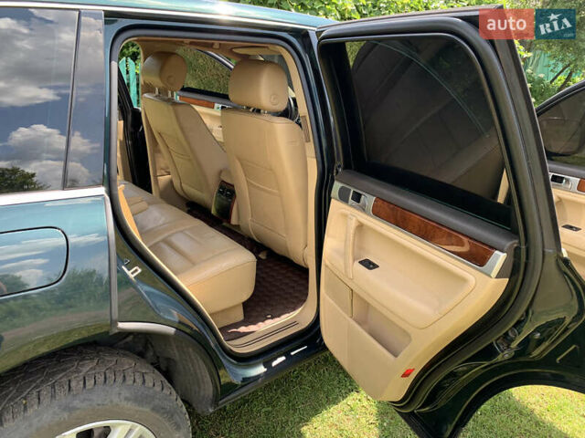 Зелений Фольксваген Туарег, об'ємом двигуна 3 л та пробігом 380 тис. км за 7200 $, фото 11 на Automoto.ua