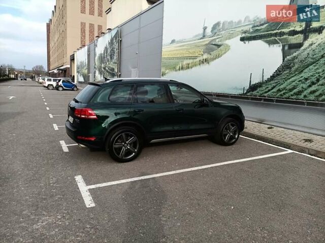 Зелений Фольксваген Туарег, об'ємом двигуна 2.97 л та пробігом 445 тис. км за 16800 $, фото 1 на Automoto.ua