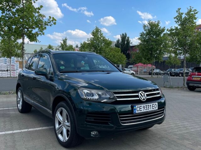 Зелений Фольксваген Туарег, об'ємом двигуна 3 л та пробігом 290 тис. км за 18865 $, фото 7 на Automoto.ua