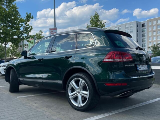 Зелений Фольксваген Туарег, об'ємом двигуна 3 л та пробігом 290 тис. км за 18865 $, фото 2 на Automoto.ua