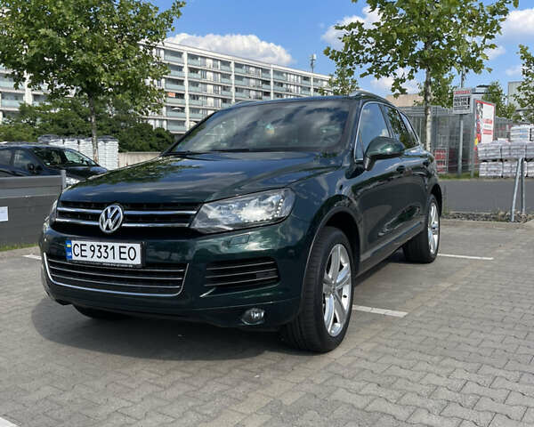 Зеленый Фольксваген Туарег, объемом двигателя 2.97 л и пробегом 279 тыс. км за 22000 $, фото 14 на Automoto.ua