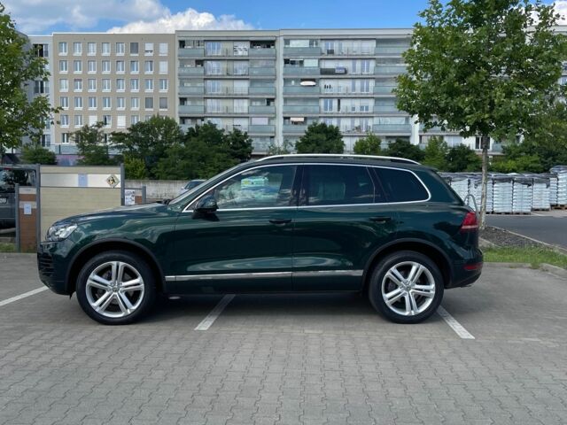 Зелений Фольксваген Туарег, об'ємом двигуна 3 л та пробігом 290 тис. км за 18865 $, фото 8 на Automoto.ua