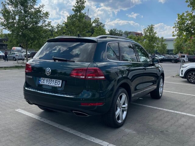 Зелений Фольксваген Туарег, об'ємом двигуна 3 л та пробігом 290 тис. км за 18865 $, фото 12 на Automoto.ua