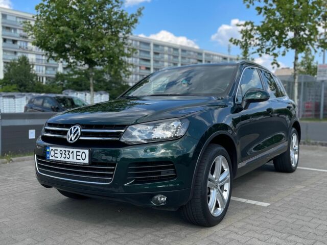 Зелений Фольксваген Туарег, об'ємом двигуна 3 л та пробігом 290 тис. км за 18865 $, фото 9 на Automoto.ua