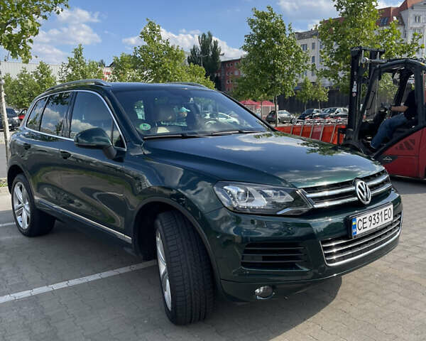 Зеленый Фольксваген Туарег, объемом двигателя 2.97 л и пробегом 279 тыс. км за 22000 $, фото 28 на Automoto.ua