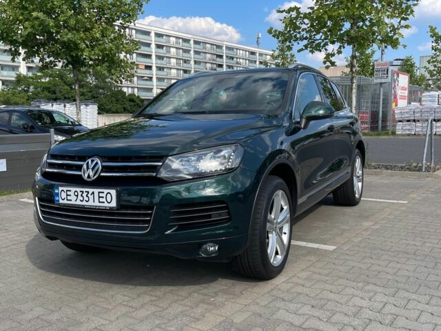 Зелений Фольксваген Туарег, об'ємом двигуна 3 л та пробігом 290 тис. км за 18865 $, фото 14 на Automoto.ua