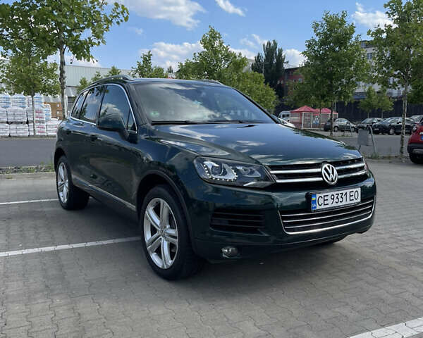 Зеленый Фольксваген Туарег, объемом двигателя 2.97 л и пробегом 279 тыс. км за 22000 $, фото 13 на Automoto.ua