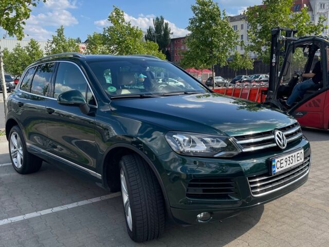 Зелений Фольксваген Туарег, об'ємом двигуна 3 л та пробігом 290 тис. км за 18865 $, фото 6 на Automoto.ua