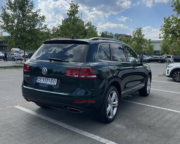 Зеленый Фольксваген Туарег, объемом двигателя 2.97 л и пробегом 279 тыс. км за 22000 $, фото 12 на Automoto.ua