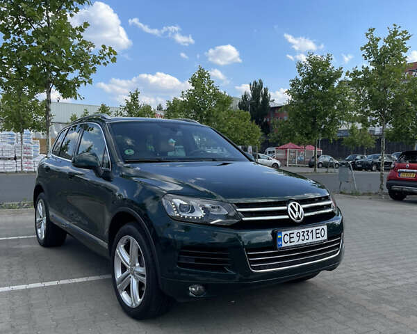 Зеленый Фольксваген Туарег, объемом двигателя 2.97 л и пробегом 279 тыс. км за 22000 $, фото 2 на Automoto.ua