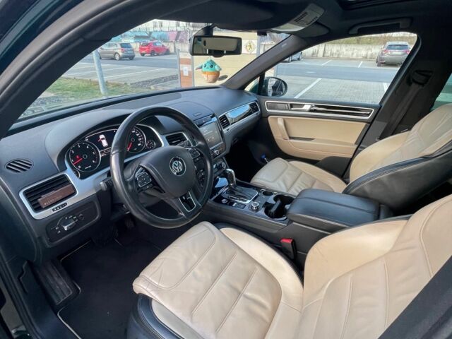 Зелений Фольксваген Туарег, об'ємом двигуна 3 л та пробігом 290 тис. км за 18865 $, фото 15 на Automoto.ua