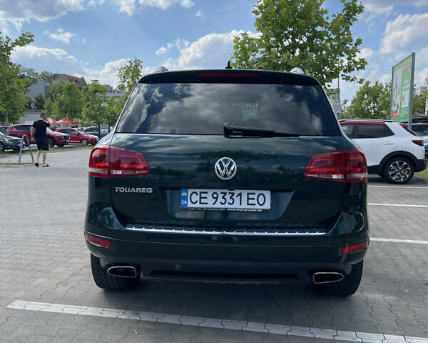 Зеленый Фольксваген Туарег, объемом двигателя 2.97 л и пробегом 279 тыс. км за 22000 $, фото 10 на Automoto.ua