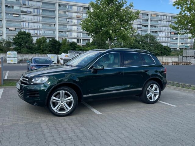 Зелений Фольксваген Туарег, об'ємом двигуна 3 л та пробігом 290 тис. км за 18865 $, фото 1 на Automoto.ua
