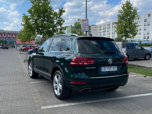 Зелений Фольксваген Туарег, об'ємом двигуна 3 л та пробігом 290 тис. км за 18865 $, фото 10 на Automoto.ua